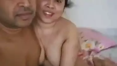 Couple naked in bed and ready for romantic sex