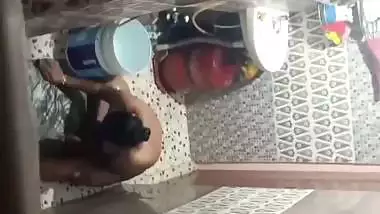 Neighbor aunty taking bath caught by voyeur